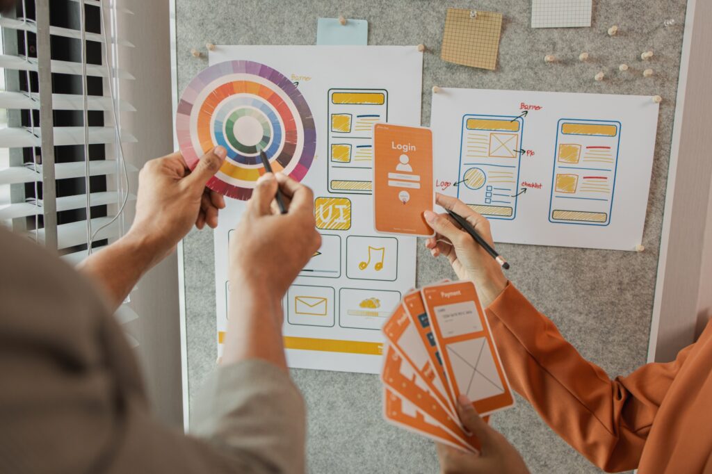 UI UX designers team working on new website wireframe in office