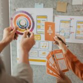 UI UX designers team working on new website wireframe in office