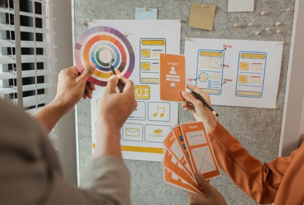UI UX designers team working on new website wireframe in office