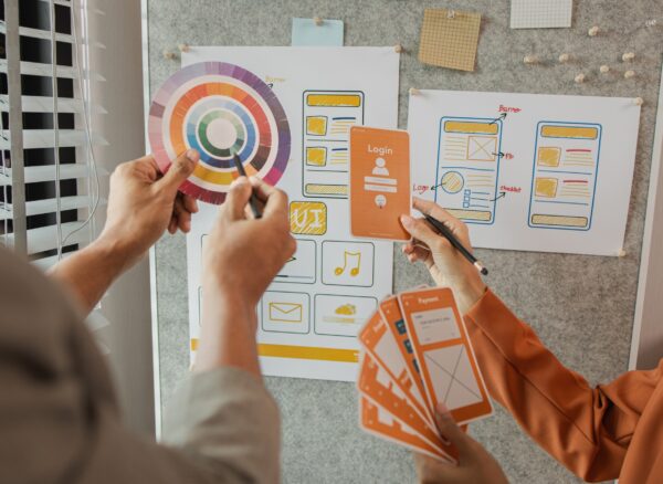 UI UX designers team working on new website wireframe in office