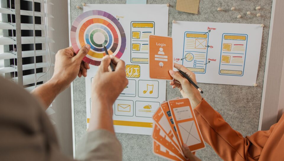 UI UX designers team working on new website wireframe in office